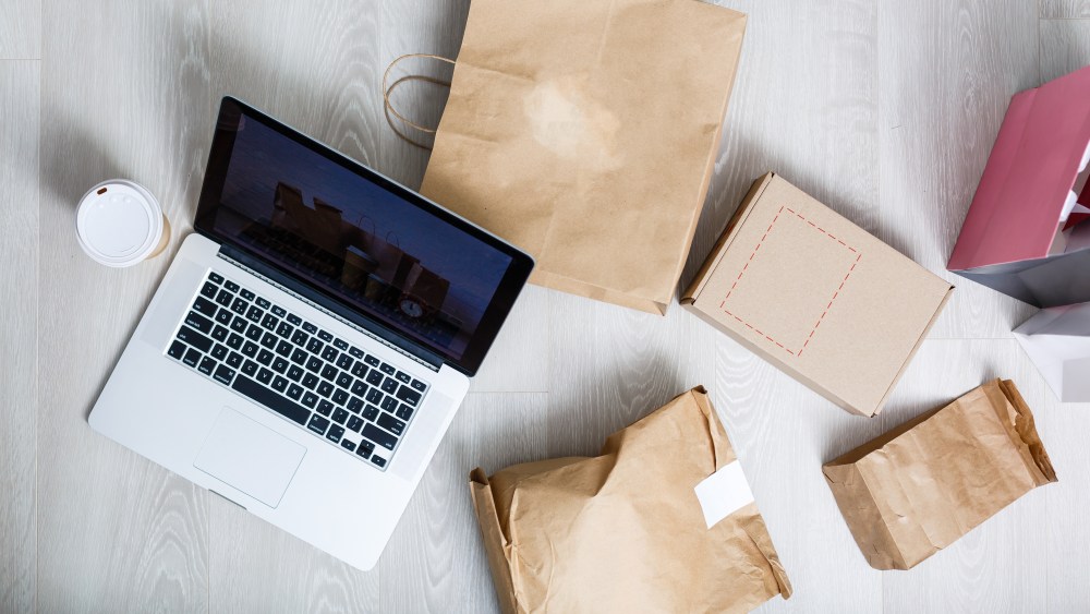 Packing accessories at workplace of startup small business owner, cardboard parcel box for online selling. entrepreneur,cardboard parcel box for online selling. shipping concept.