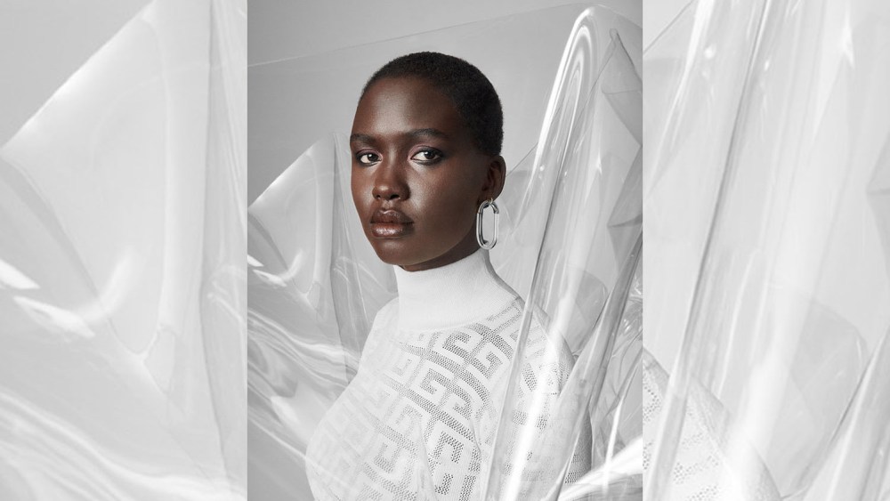 Givenchy’s viscose and polyester sweater. Lady Grey earring.
