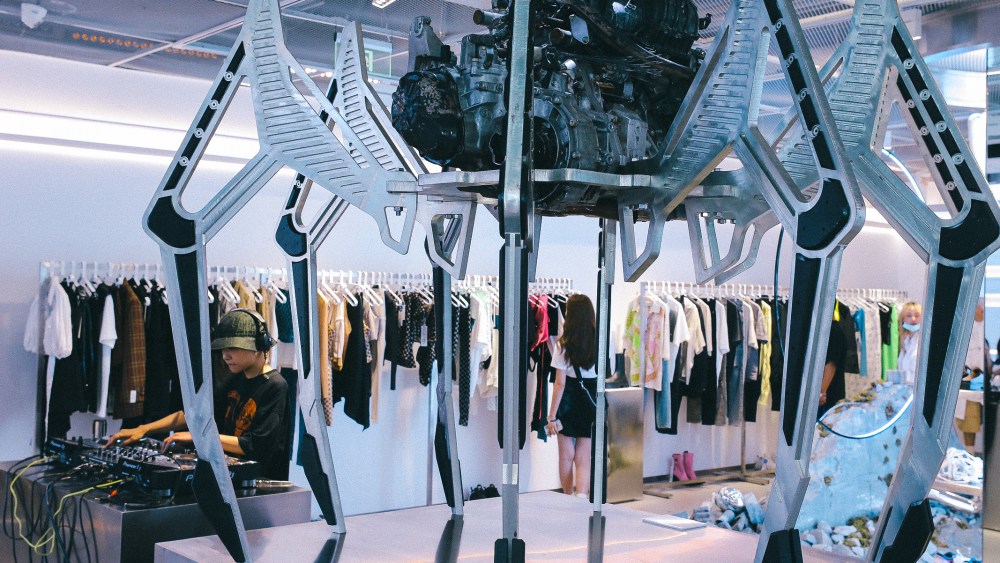 A large-scale robotic spider installation by visual artist Carlos Saez inside ENG store in Shanghai's TX Huaihai