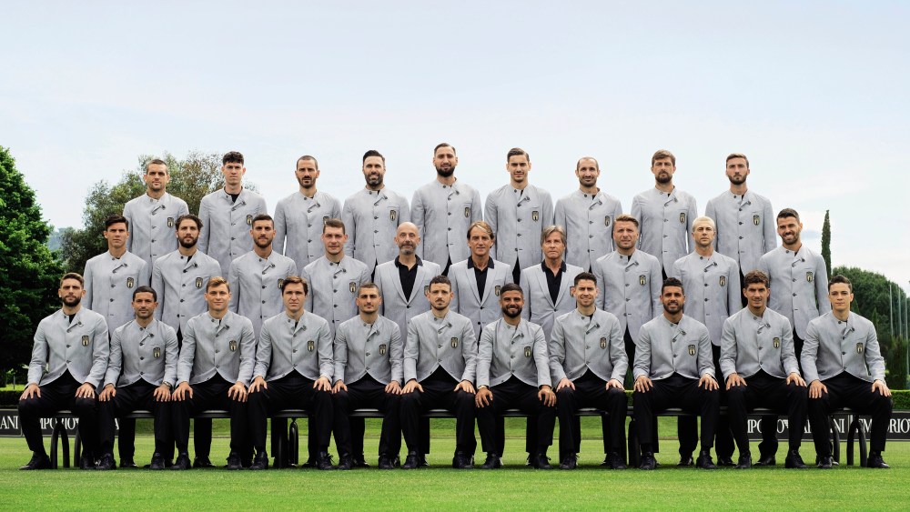 The Italian soccer team sporting the Emporio Armani off-field uniforms.