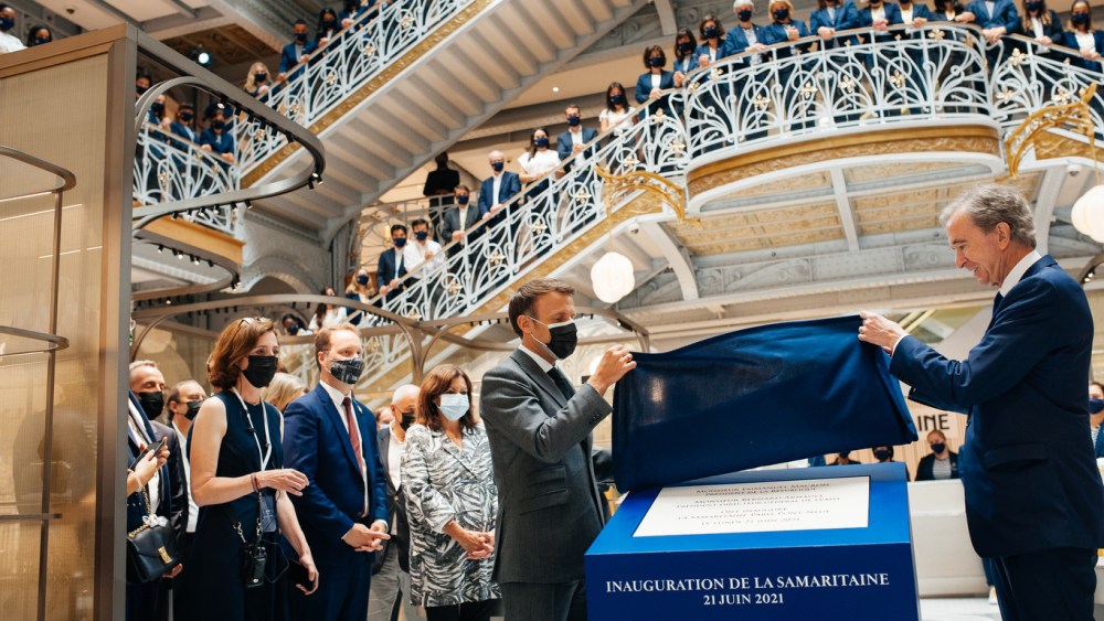 French President Emmanuel Macron joined luxury magnate Bernard Arnault to inaugurate the renovated La Samaritaine department store in Paris.