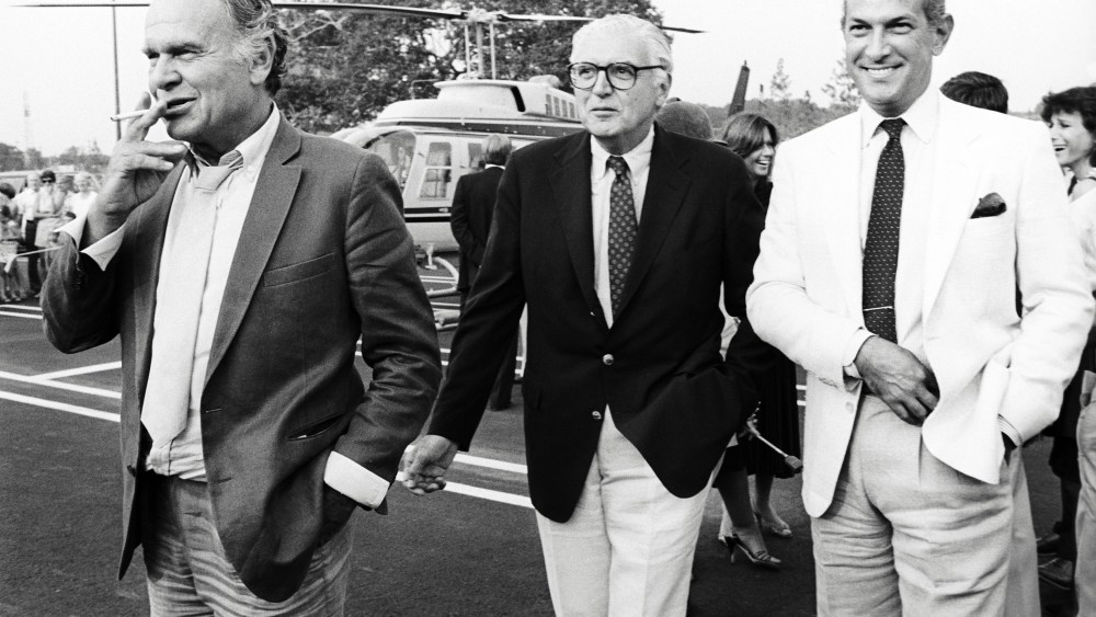Bill Blass; Marvin Traub, CEO and president of Bloomingdale's, and Oscar de la Renta attend an event for the Children's Hospital of Philadelphia in August 1982.