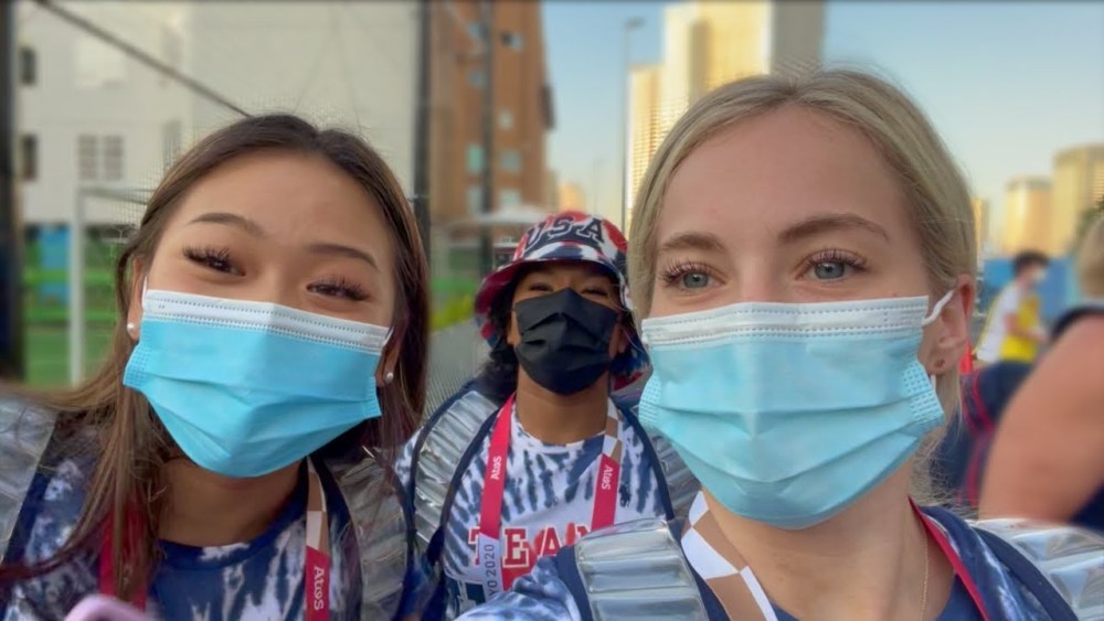 U.S. gymnast MyKayla Skinner poses with teammates Sunisa “Suni” Lee and Jordan Chiles as they film their experience at the Olympics.