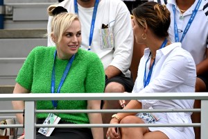 Rebel Wilson and Brittany Hockley watch a Men's Singles match between Jordan Thompson and Gianluca Mager at the 2021 US Open, Tuesday, Aug. 31, 2021 in Flushing, NY. (Garrett Ellwood/USTA)