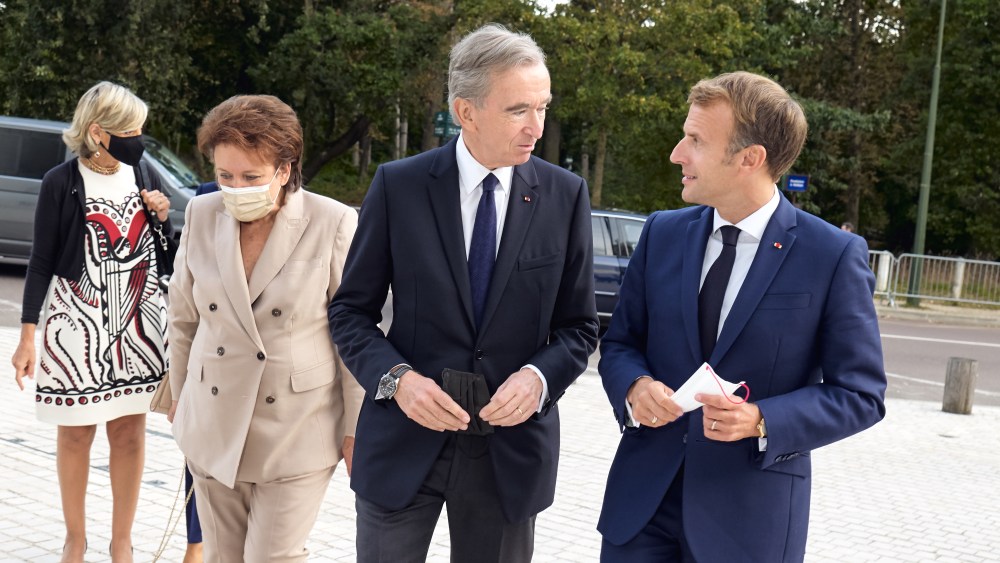 LVMH chief Bernard Arnault and French President Emmanuel Macron, with Hélène Arnault and Culture Minister Roselyne Bachelot in the background.