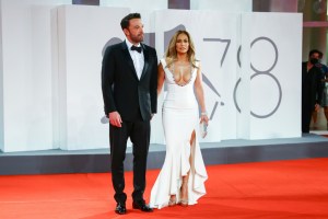 Jennifer Lopez, right, and Ben Affleck pose for photographers upon arrival at the premiere of the film 'The Last Duel' during the 78th edition of the Venice Film Festival in Venice, Italy, Friday, Sept. 10, 2021. (Photo by Joel C Ryan/Invision/AP)