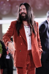 Alessandro Michele poses for photographers upon arrival at the premiere of the film 'The Lost Daughter' during the 78th edition of the Venice Film Festival in Venice, Italy, Friday, Sep, 3, 2021. (AP Photo/Domenico Stinellis)