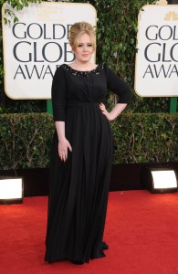 Singer Adele arrives at the 70th Annual Golden Globe Awards at the Beverly Hilton Hotel on Sunday Jan. 13, 2013, in Beverly Hills, Calif. (Photo by Jordan Strauss/Invision/AP)