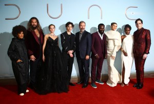 Golda Rosheuvel, from left, Jason Momoa, Rebecca Ferguson, Timothee Chalamet, director Denis Villeneuve, Babs Olusanmokun, Zendaya, Sharon Duncan-Brewster, and David Dastmalchian pose for photographers upon arrival at the premiere of the film 'Dune' on Monday, Oct. 18, 2021 in London. (Photo by Joel C Ryan/Invision/AP)