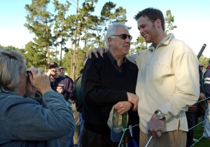 New England Patriots quarterback and Super Bowl MVP Tom Brady, right, poses for a picture with Vince Pitino before teeing off on the first hole of the Poppy Hills Golf Course during the first round of the AT&T Pebble Beach National Pro-Am in Pebble Beach, Calif., Thursday Feb. 5, 2004.  (AP Photo/Ben Margot)