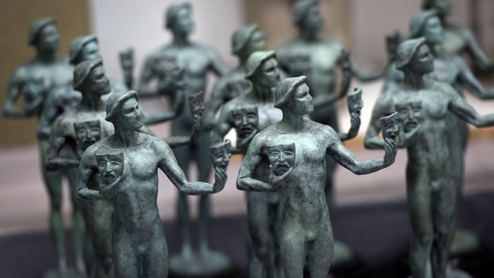 FILE - Finished solid bronze Actor statuettes are displayed during the 25th Annual Casting of the Screen Actors Guild Awards at American Fine Arts Foundry, Tuesday, Jan. 15, 2019, in Burbank, Calif.  The 2022 SAG Awards are scheduled to take place on Feb. 27. (Photo by Chris Pizzello/Invision/AP, File)