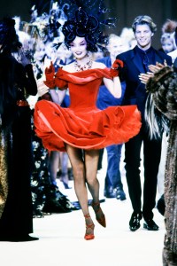 Model Irina Pantaeva on the runway at Thierry Mugler Fall 1997 Couture And Ready To Wear Runway Show.