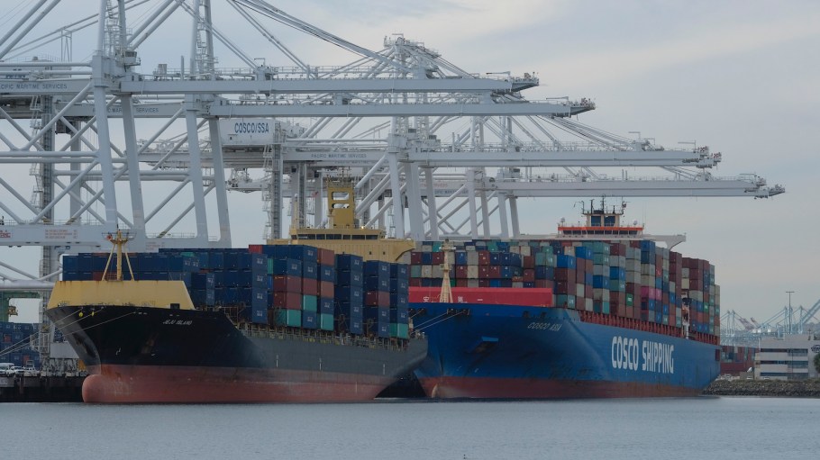 Cargo ships stacked with shipping containers are docked at the Port of Long Beach. Calif., Monday, Jan. 10, 2022.