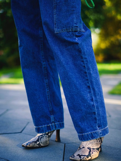 Looser jeans are adding newness to stores, but Edited says retailers are still using deep discounts to push out old stock.