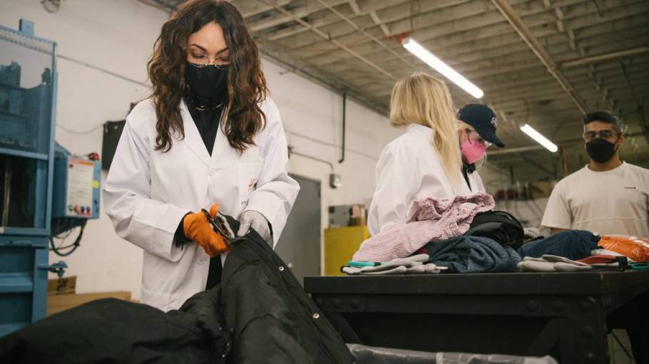 Actress Rosario Dawson, who served as a spokesperson for H&M's 2019 Conscious Collection, visited Ambercycle's Los Angeles textile recycling laboratory.
