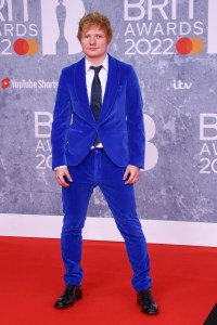 Ed Sheeran poses for photographers upon arrival at the Brit Awards 2022 in London Tuesday, Feb. 8, 2022. (Photo by Joel C Ryan/Invision/AP)