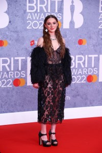 Holly Humberstone poses for photographers upon arrival at the Brit Awards 2022 in London Tuesday, Feb. 8, 2022. (Photo by Joel C Ryan/Invision/AP)