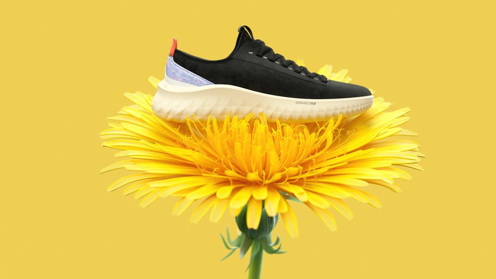 Cole Haan Generation Zerogrand II shoe shown sitting on a dandelion because it is made from dandelion rubber.
