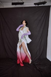Bach Mai: Celadon Silk Organza Sleeveless Double-Breasted Gilet over a "Watermelon" Dip-Dyed Draped Bias Gown with Wisteria Leather Opera Gloves.