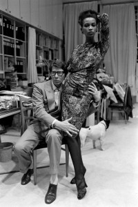 Yves Saint Laurent at his Paris Atelier with model Amalia Vairelli in a look from the YSL Couture Fall 1985 Collection.