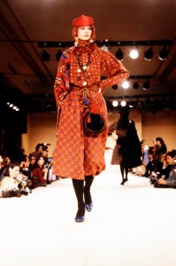 A model poses in an ensemble from Yves Saint Laurent's RTW Fall 1980 collection.