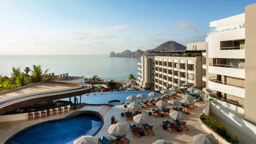 Corazon Cabo hotel infinity pool and guest rooms.