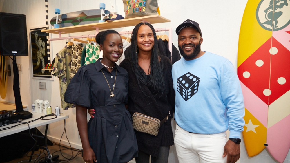 Lupita Nyong'o, left; Joy Bryant, center, and brand cofounder Selema Masekela at the opening of the Mami Wata Surf Shop in Venice, Calif., on March 30, 2022.