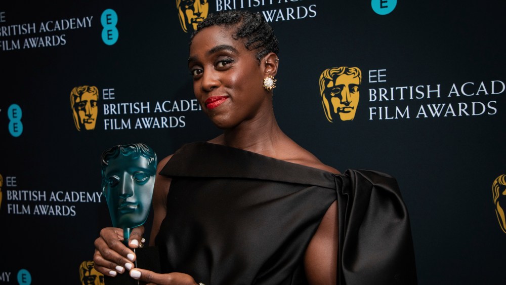 Lashana Lynch poses for photographers upon arrival at the 75th British Academy Film Awards, BAFTA's, awards dinner in London Sunday, March 13, 2022. (Photo by Vianney Le Caer/Invision/AP)