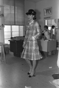 A model poses in a plaid suit with slingback pumps from Chanel's Fall 1973 haute couture collection. The collection was the debut of newly hired artistic director Ramon Esparza.