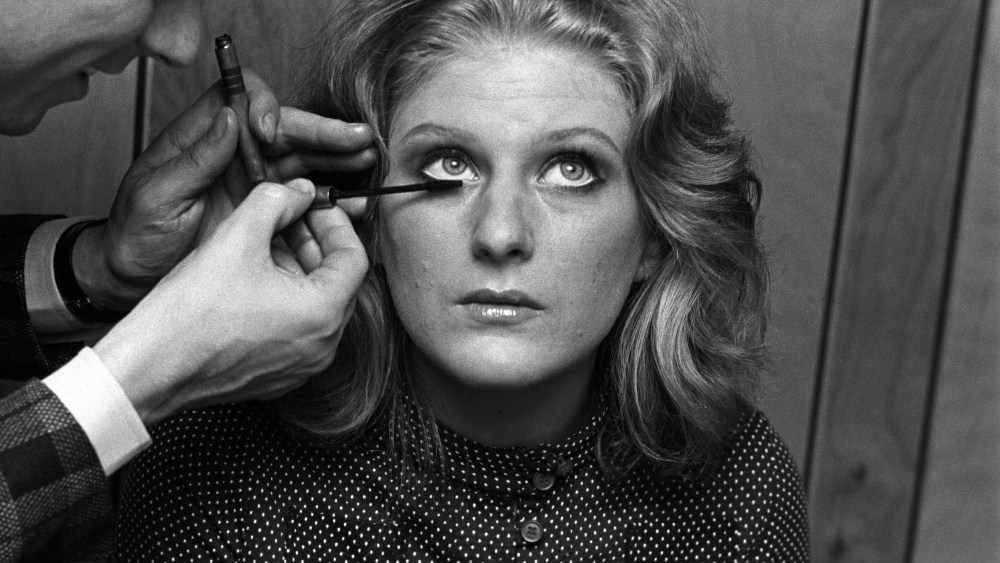 A woman living at a Samaritan half-way house is treated to make-up tips by a cosmetician to aid her recovery from drug addiction .  The program is sponsored by Elizabeth Arden.