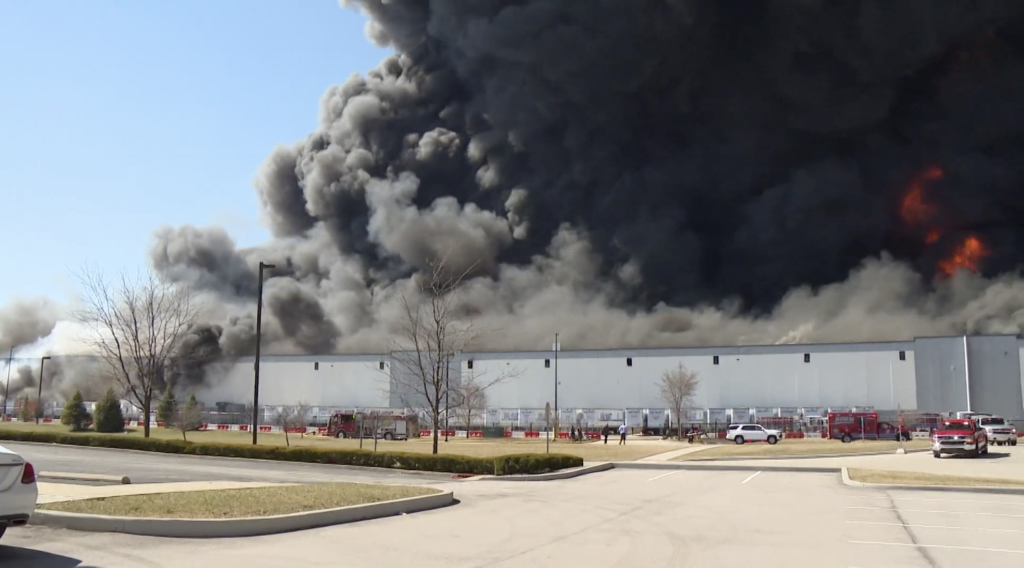 A massive fire ravaged a Walmart distribution center in Plainfield, Ind. on Wednesday, leaving the 1.2-million-square-foot facility in rubble and leaving a trail of black smoke that could be seen from space.