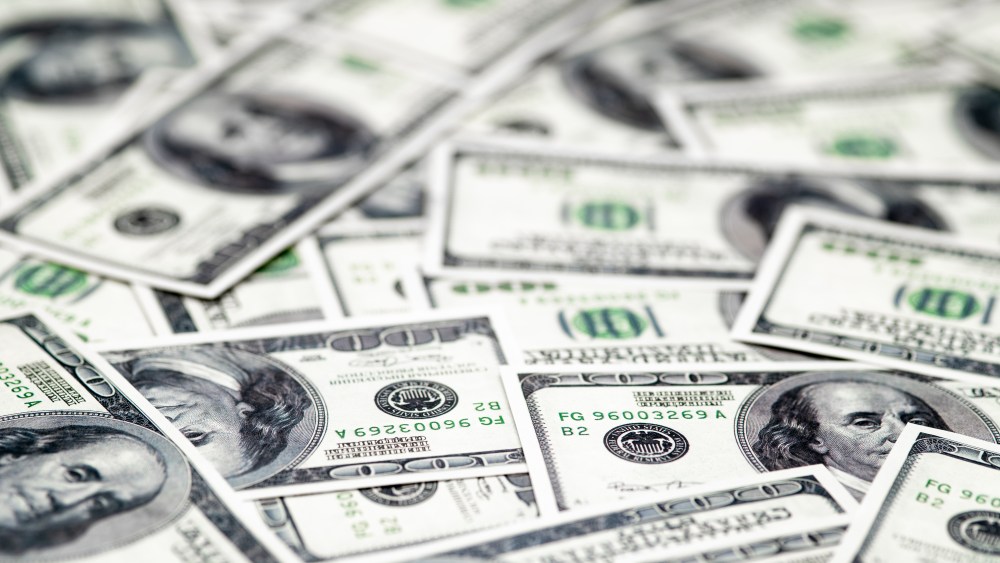 Photo of close up money background with shallow DOF. Business concept