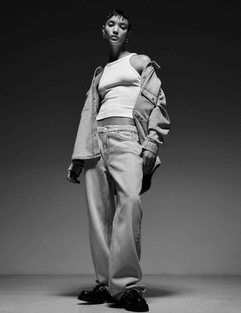 The collection includes five jeans styles along with a jumpsuit and basic tops.
