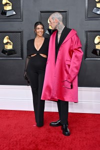 Kourtney Kardashian and Travis Barker at the 64th Annual Grammy Awards held at the MGM Grand Garden Arena on April 3rd, 2022 in Las Vegas, Nevada.