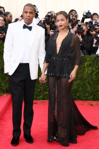 Jay-Z (L) and Beyoncé in Givenchy Haute Couture attend the Metropolitan Museum of Art's 2014 Costume Institute Gala featuring the opening of the exhibit "Charles James: Beyond Fashion."