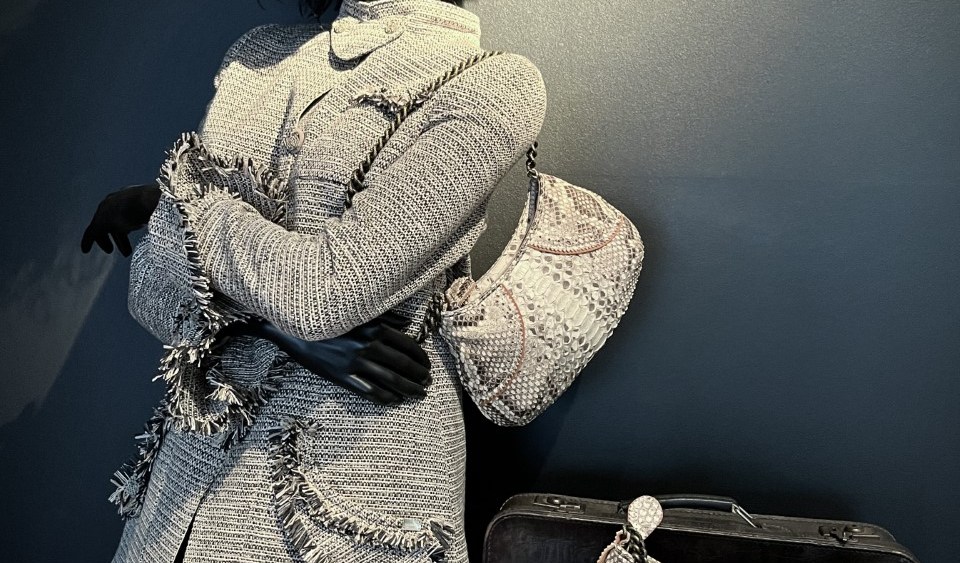 A wool and linen jacket with python bags by Albrecht Olliendek.