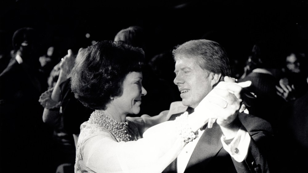 In this photograph taken on January 20, 1977, President Jimmy Carter and First Lady Rosalynn Carter dance among their guests at their inaugural ball.
