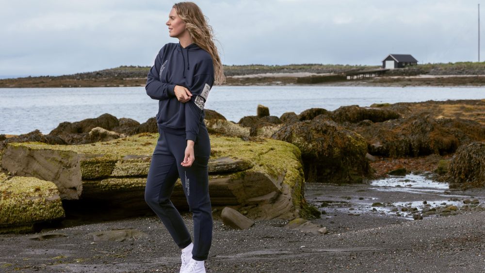 Icelandic actress Ragga Ragnars sports the new seaweed-powered grey sweatsuit from brand Katla.