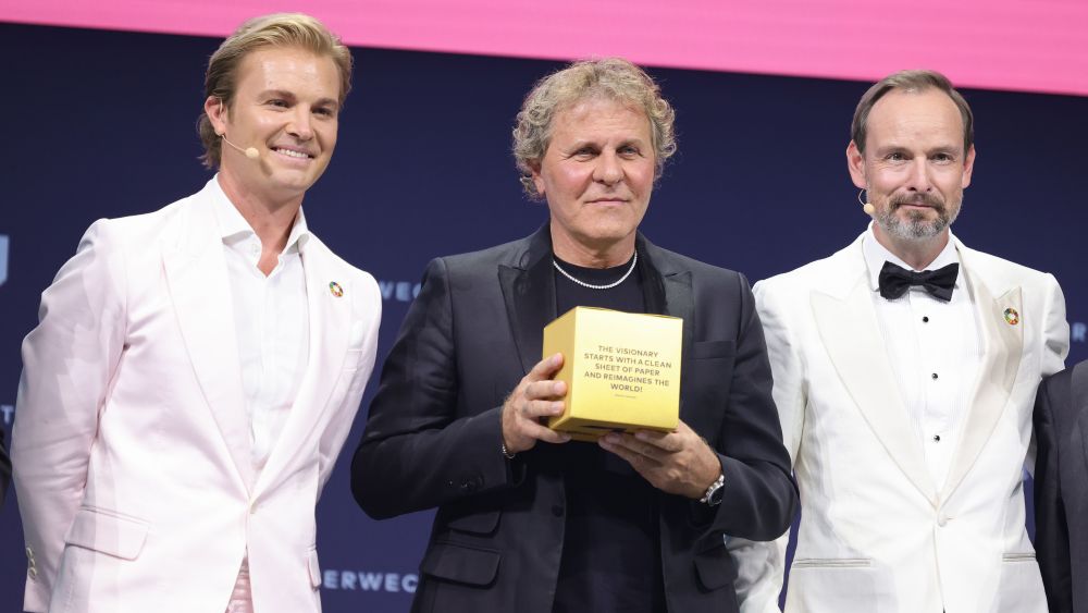 BERLIN, GERMANY - JUNE 22: Italian Special Award winner Renzo Rosso (C) and Greentech Festival Co-Founders Nico Rosberg (L) and Marco Voigt (R)  speak on stage at the Green Awards during day 1 of the Greentech Festival on June 22, 2022 in Berlin, Germany. The Greentech Festival is the first festival to celebrate green technology and to accelerate the shift to more sustainability. The festival takes place from June 22 to 24.  (Photo by Andreas Rentz/Getty Images for Greentech Festival)