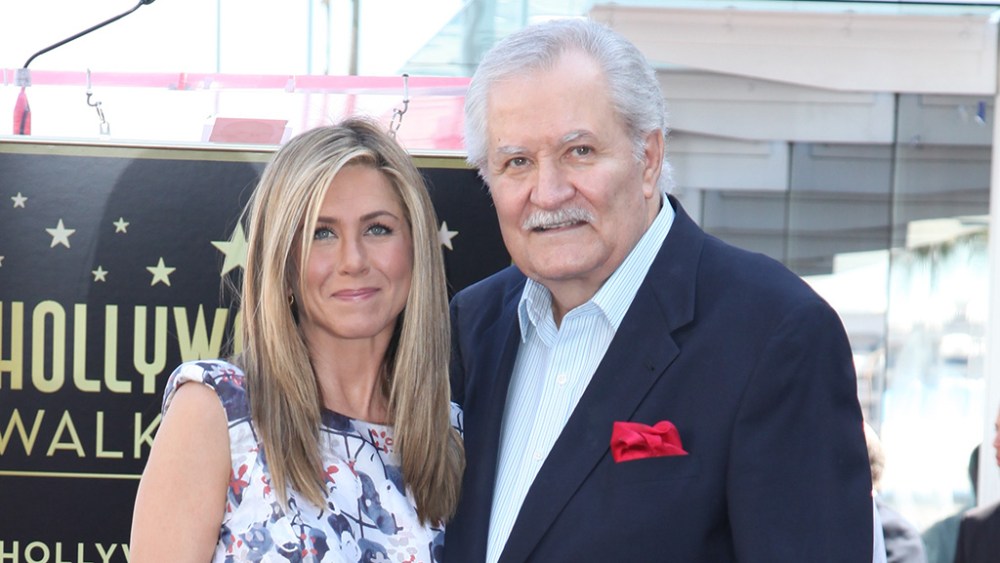Jennifer Aniston and John Aniston pose as Jennifer Aniston is honored with a star on the Hollywood Walk of Fame in front of the W Hotel in Hollywood, CA on Wednesday, February 22, 2012.(Alex J. Berliner/abimages) via AP Images