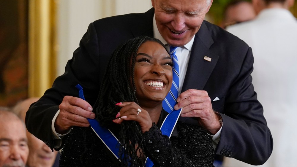 President Joe Biden awards the nation's highest civilian honor, the Presidential Medal of Freedom, to Simone Biles at the White House in Washington, Thursday, July 7, 2022. (AP Photo/J. Scott Applewhite)