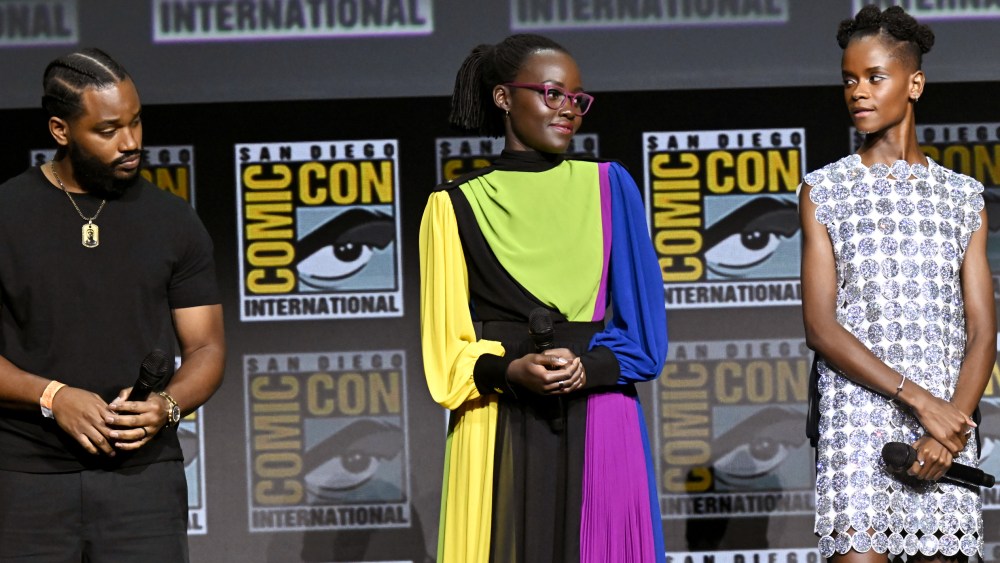 Ryan Coogler, Lupita Nyong'o and  Letitia Wright speak onstage during the Marvel Studios panel in Hall H at the 2022 Comic-Con International held at the San Diego Convention Center on July 23, 2022 in San Diego, California.  (Photo by Michael Buckner/Variety via Getty Images)