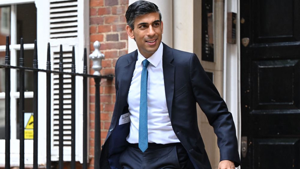 Rishi Sunak, Britain's former chancellor of the exchequer and candidate to become the next prime minister, leaves his campaign office in London on July 20, 2022. - The final two candidates to become UK prime minister will be decided today, with Sunak only two votes short of securing his place after yesterday's voting. (Photo by JUSTIN TALLIS / AFP) (Photo by JUSTIN TALLIS/AFP via Getty Images)