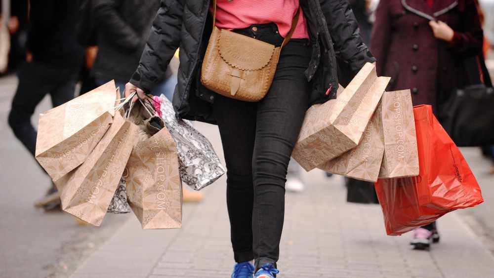 Fashion sales figures. File photo dated 06/12/11 of a lady carrying shopping bags. High street fashion retailers have suffered their worst July since 2009 as shoppers divert their attention to essential spending, figures suggest. Issue date: Friday August 4, 2017. See PA story CONSUMER HighStreet. Photo credit should read: Dominic Lipinski/PA Wire URN:32282171