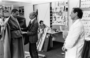 Marc Bohan observes a fit session with a model for the Christian Dior fall 1978 Haute Couture collection in the Dior design studios in Paris on July 7, 1978.