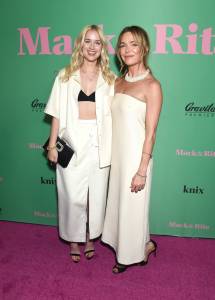 Elizabeth Lail and Katie Aselton at the Los Angeles premiere of "Mack & Rita" held at the Rooftop Terrace at NeueHouse Hollywood on August 10, 2022 in Los Angeles, California