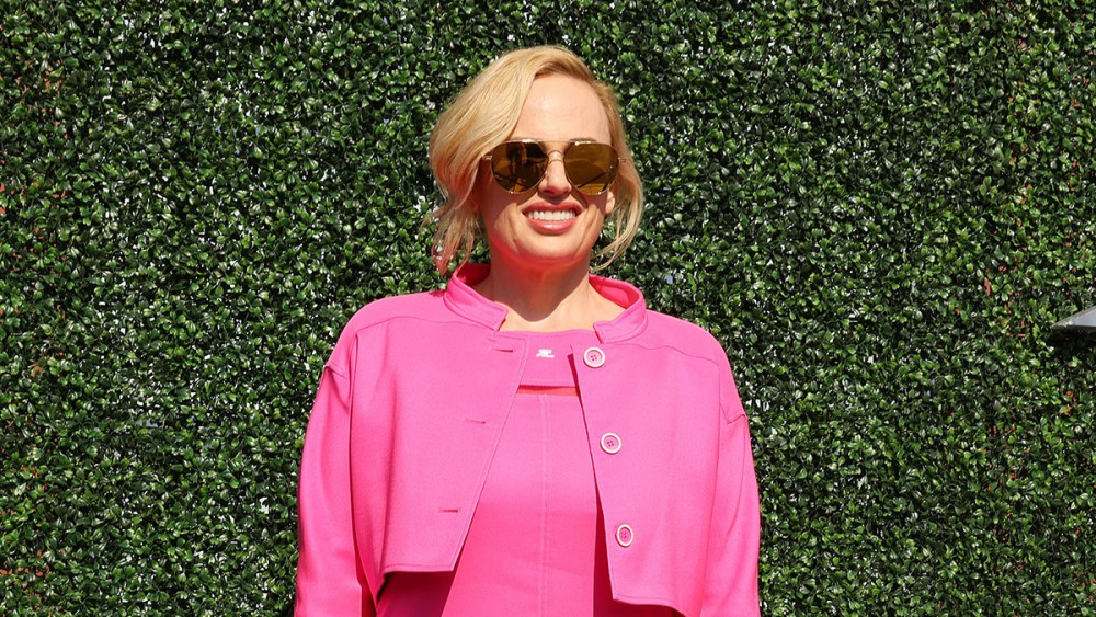 NEW YORK, NEW YORK - AUGUST 29: Rebel Wilson in pink barbiecore suit and celebrities arrives on Day One of the 2022 US Open at USTA Billie Jean King National Tennis Center on August 29, 2022 in the Flushing neighborhood of the Queens borough of New York City. (Photo by Mike Stobe/Getty Images)
