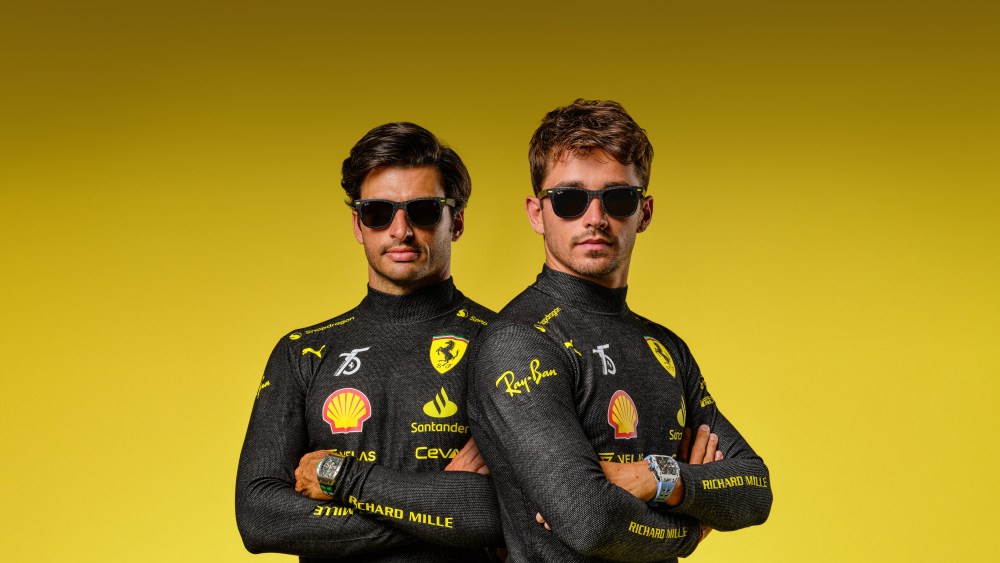 Carlos Sainz Jr. and Charles Leclerc of Scuderia Ferrari in limited-edition Ray-Ban glasses to mark the team's 75th anniversary at Monza.
