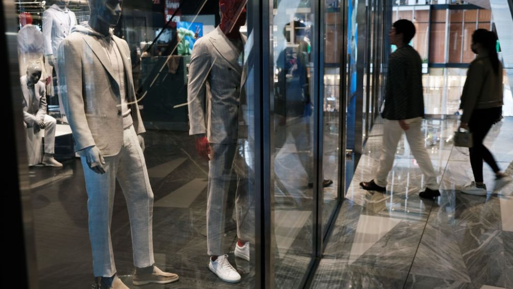 NEW YORK, NEW YORK - MAY 12: Men's suits are displayed in a window at the Hudson Yards Mall on May 12, 2022 in New York City. Prices of clothing, food, gas and cars are just a few of the items that are hitting Americans' pocketbooks despite historically low unemployment. Giving hope to economists, some key inflation indicators have finally begun to slow in April. (Photo by Spencer Platt/Getty Images)