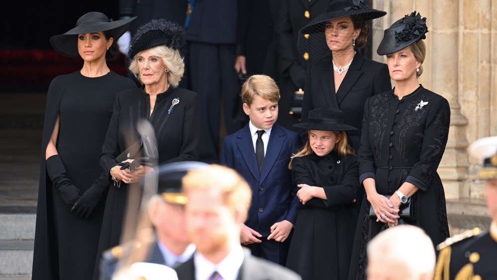 LONDON, ENGLAND - SEPTEMBER 19: (L-R) Meghan, Duchess of Sussex, Camilla, Queen Consort, Prince George of Wales, Catherine, Princess of Wales, Princess Charlotte of Wales and Sophie, Countess of Wessex during the State Funeral of Queen Elizabeth II at Westminster Abbey on September 19, 2022 in London, England. Elizabeth Alexandra Mary Windsor was born in Bruton Street, Mayfair, London on 21 April 1926. She married Prince Philip in 1947 and ascended the throne of the United Kingdom and Commonwealth on 6 February 1952 after the death of her Father, King George VI. Queen Elizabeth II died at Balmoral Castle in Scotland on September 8, 2022, and is succeeded by her eldest son, King Charles III. (Photo by Karwai Tang/WireImage)